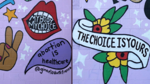 A decorative photo showing two art pieces relating to reproductive freedom.